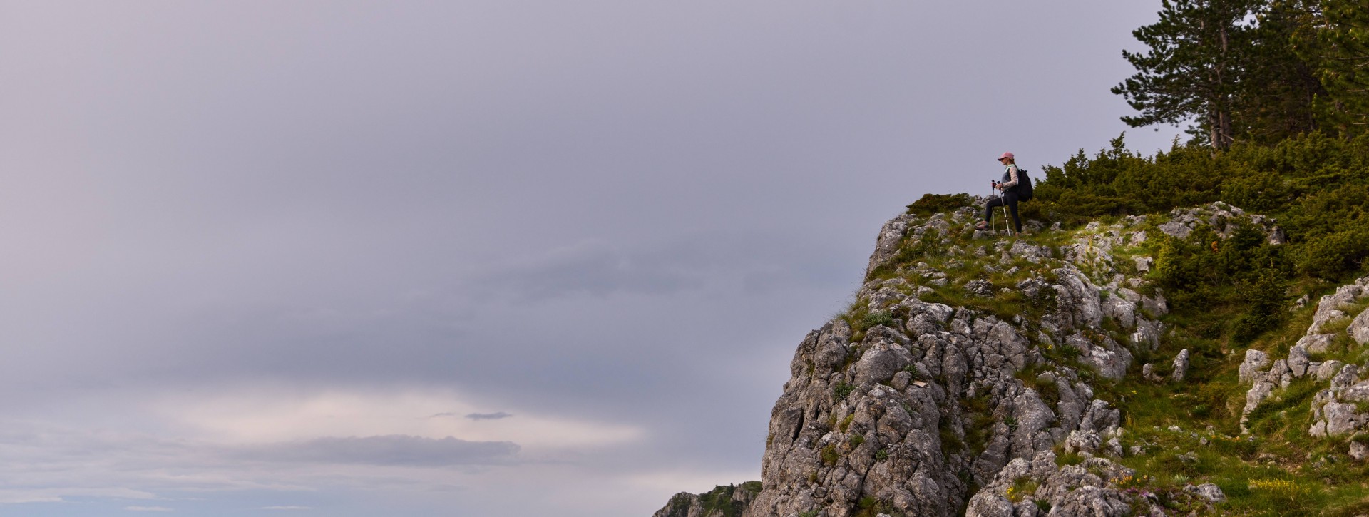 Woman at top of mountain